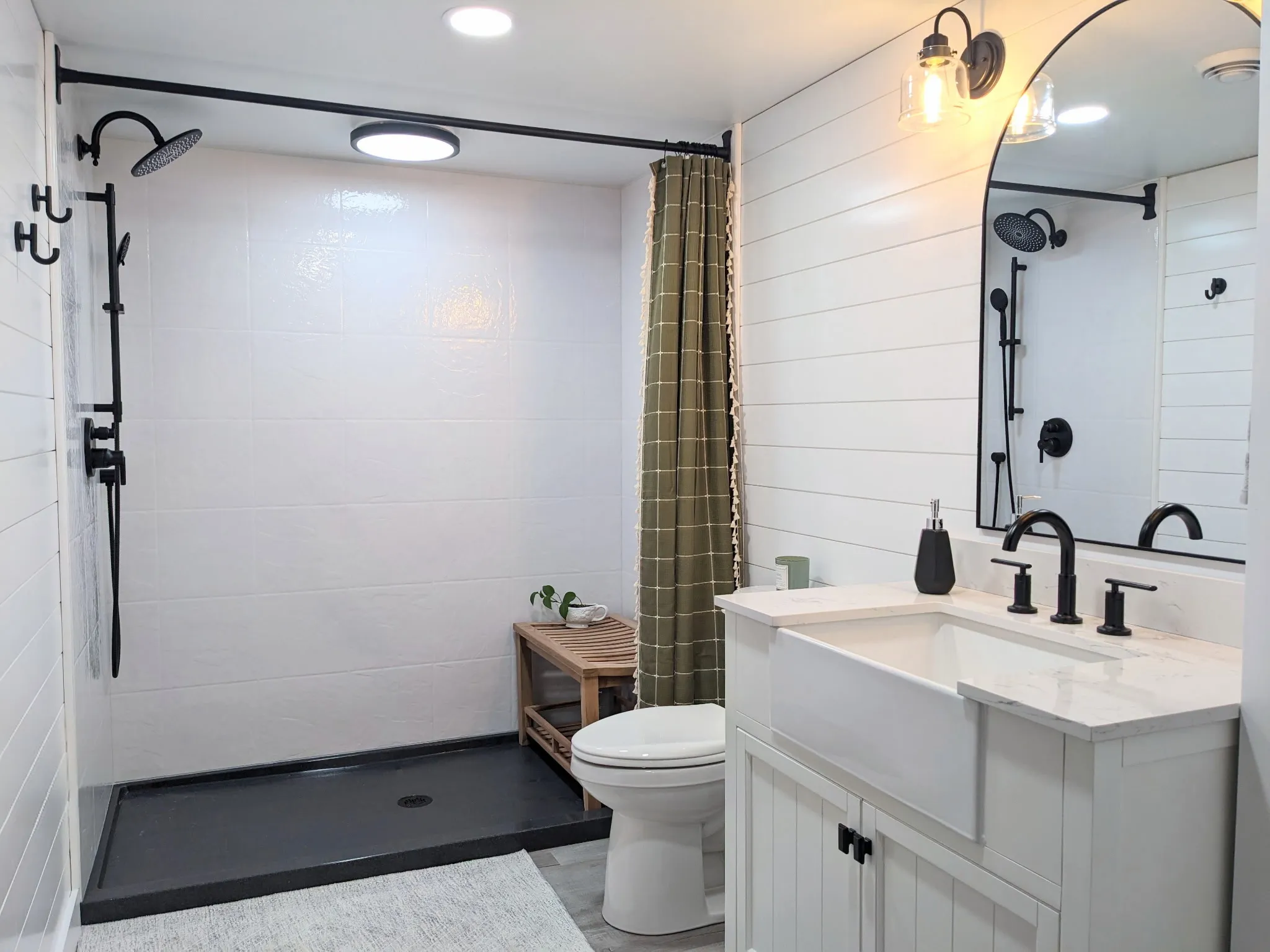 Finished bathroom remodel with a walk-in shower and vanity